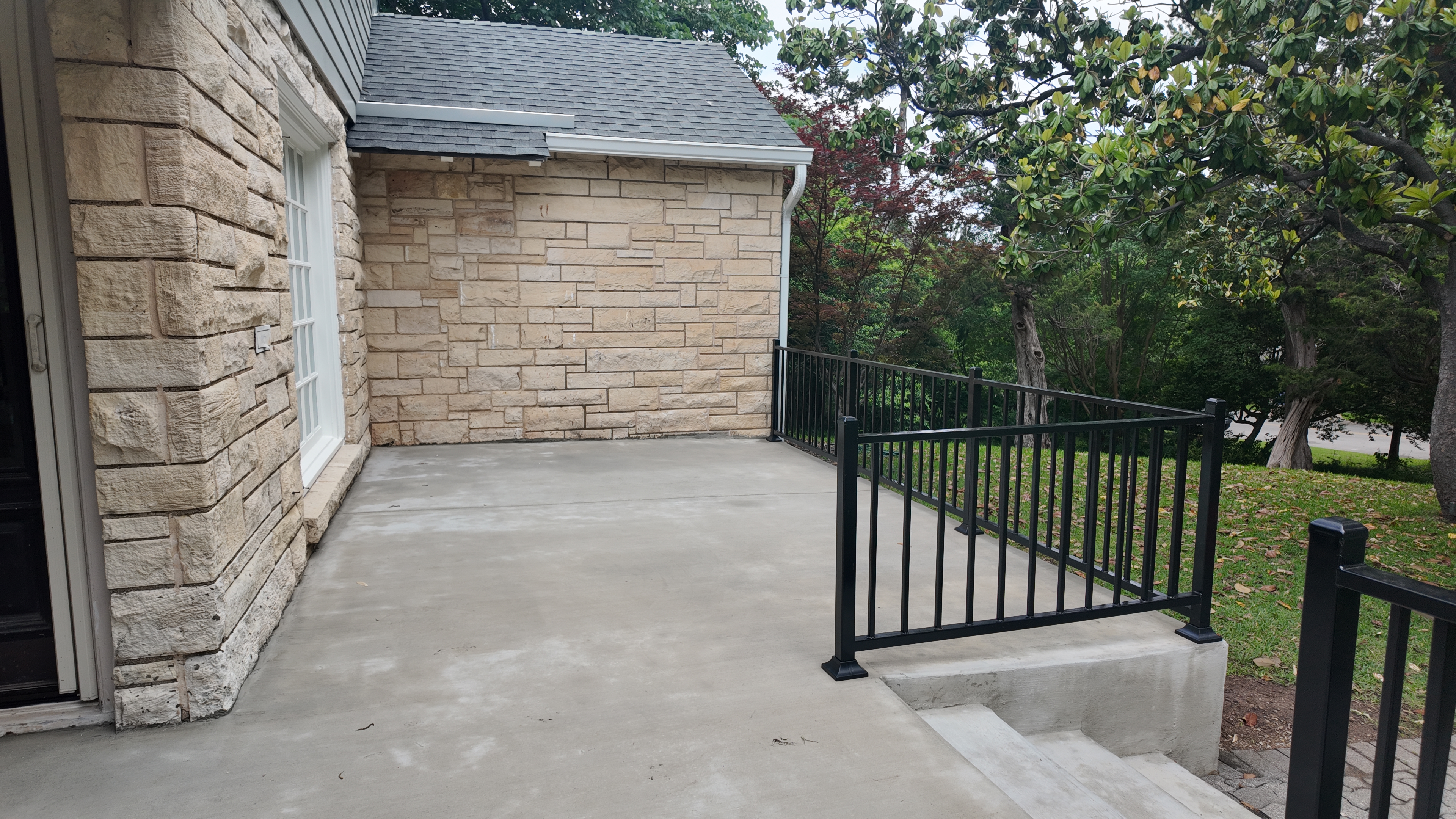 Concrete patio drone view in Kessler Park Dallas - gallery photo 3